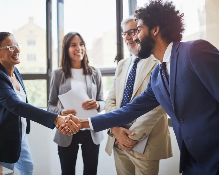 high net worth individuals in a business meeting